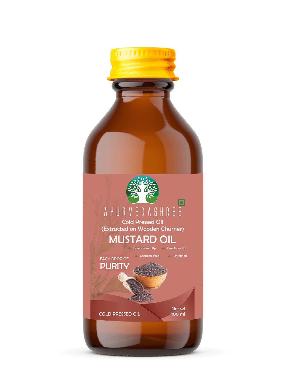 AYURVEDASHREE mustard oil poured from wooden churner, traditional extraction preserves nutrients.