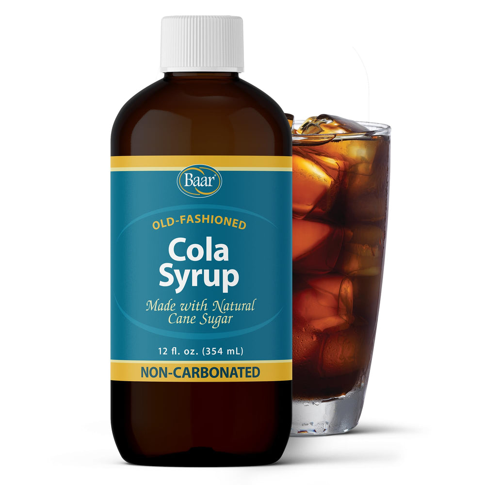 Baar Cola Syrup bottle on ice offers a refreshing, caffeine-free option