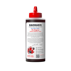 Pouring Bachan's sauce over skewers for a teriyaki glaze.