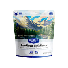 Backpacker's Pantry Three Cheese Mac & Cheese bowl on camp table for trail meals
