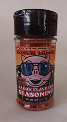 Bacon Freak Boss Hog Bacon Seasoning bottle pouring for rich, smoky flavor at home.