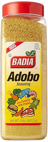 Badia Adobo seasoning on a spoon illustrating versatile use for vegetables