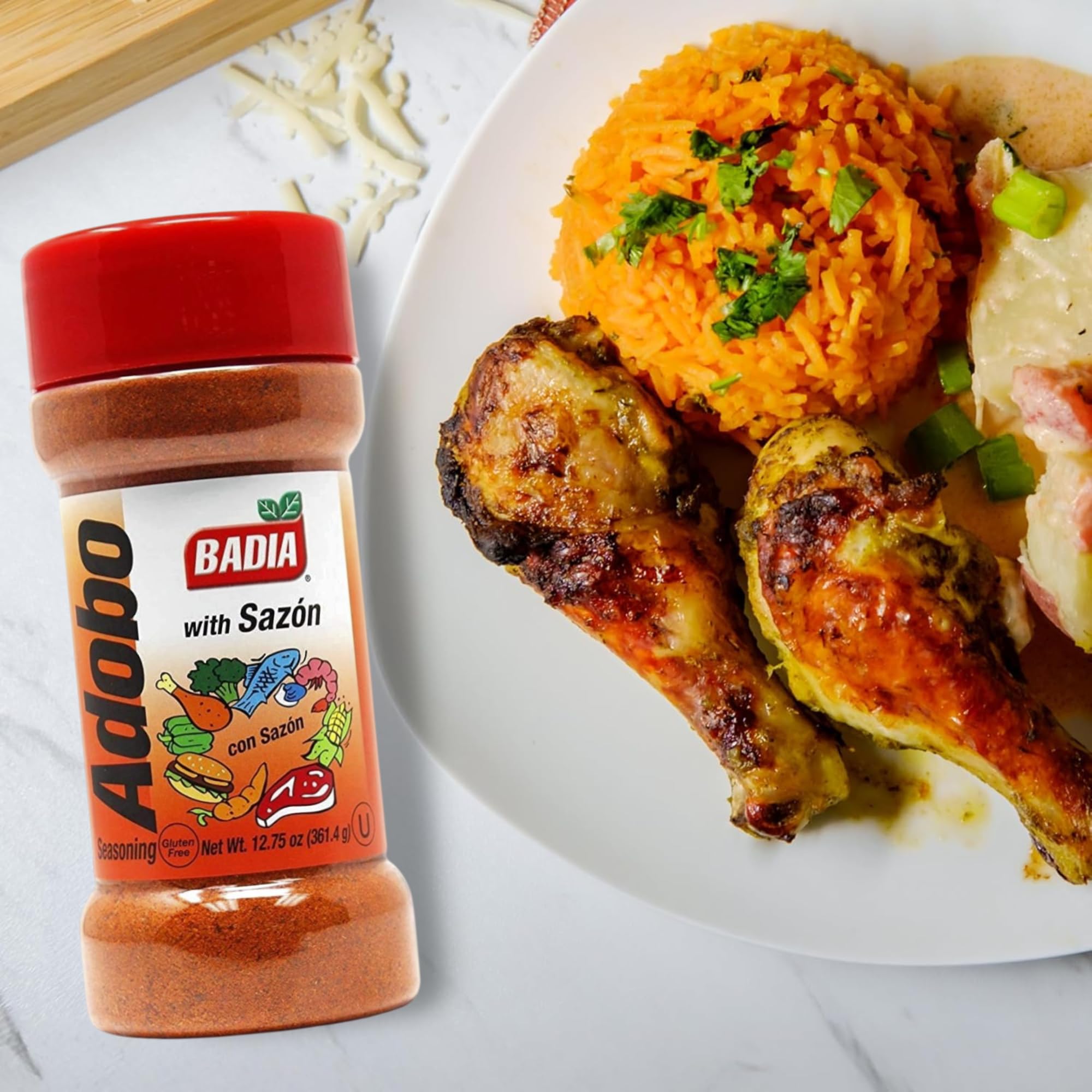 Badia Adobo with Sazon sprinkle on chicken, delivering rich flavor.