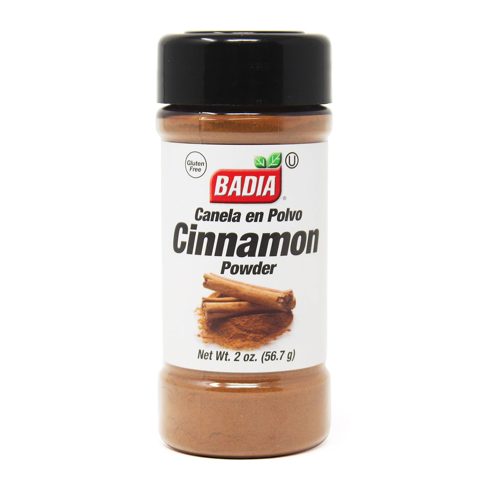 Badia Cinnamon Powder bottle close-up highlights warm aroma for baking.