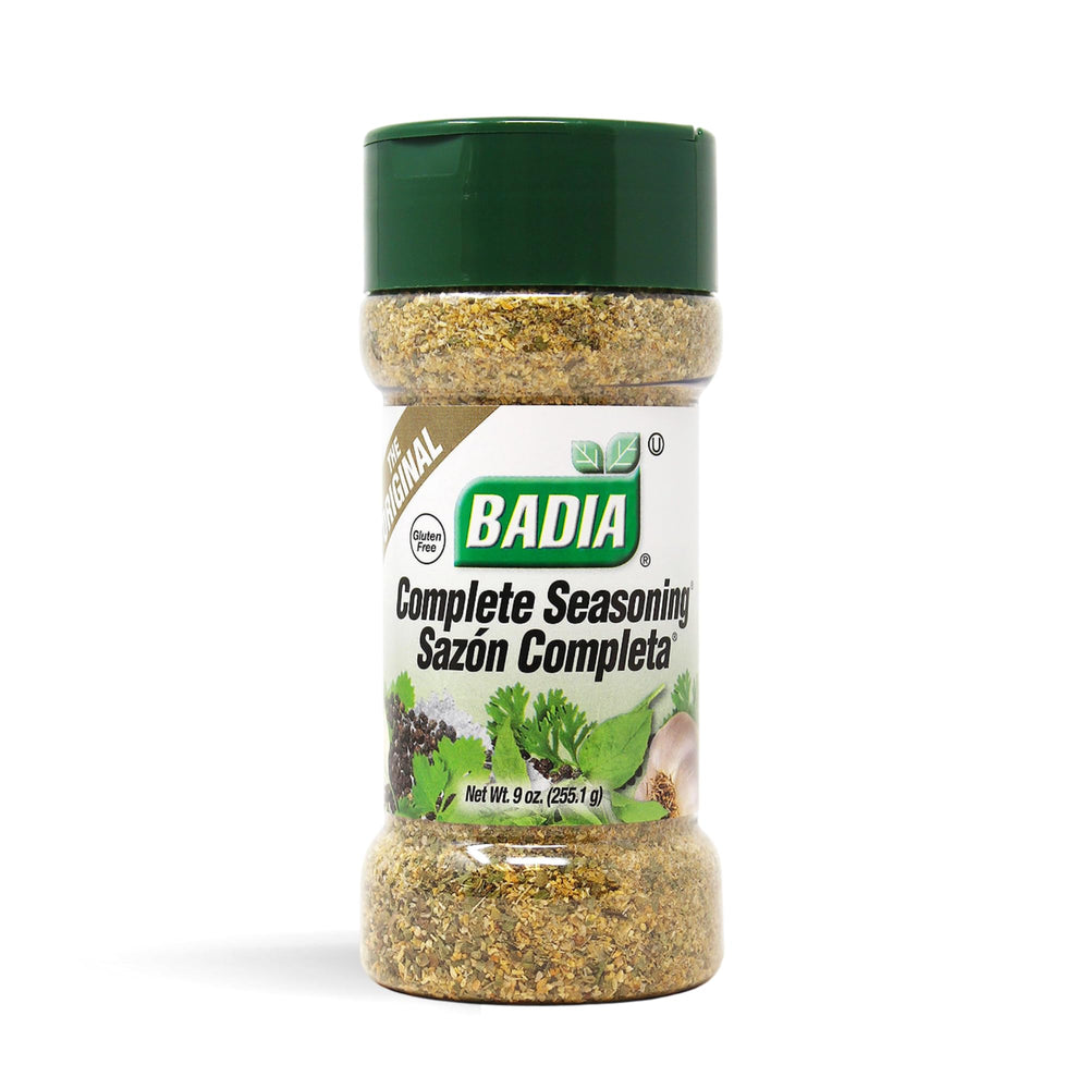 Badia Complete Seasoning shaker close-up showcasing versatile all-purpose flavor for meals.