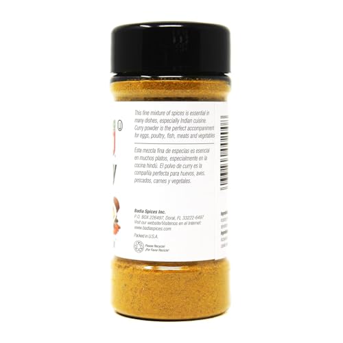 Badia Curry Powder spice-scoop highlighting versatile seasoning for eggs, meats, vegetables.