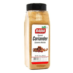 Close-up of Badia ground coriander bottle pour for flavorful seasoning