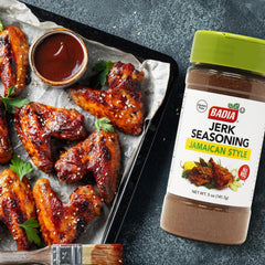 Badia Jerk Seasoning Jamaican Style being poured over meat for flavor boost