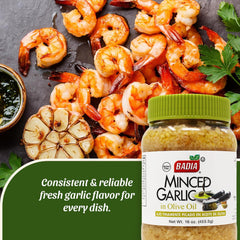 Badia minced garlic in olive oil glass jar on kitchen shelf for easy access.