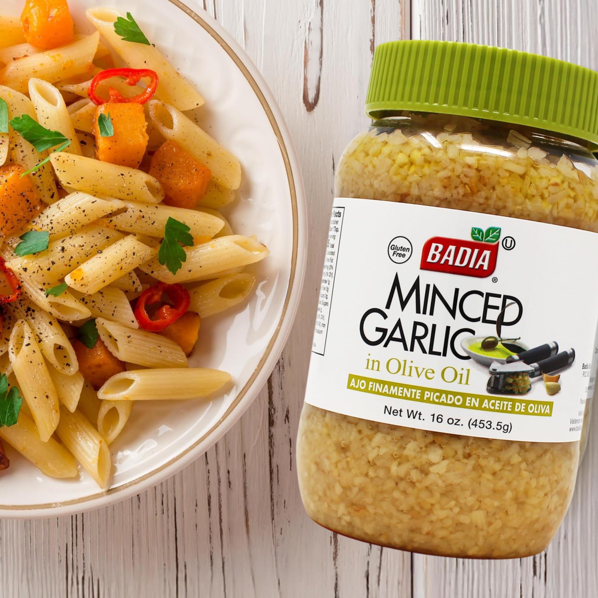 Badia minced garlic in olive oil heats in a pan for vibrant stir-fries.