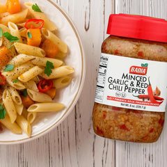 Badia Minced Garlic & Red Chili Pepper close-up reveals savory flakes ideal for stir-fries.