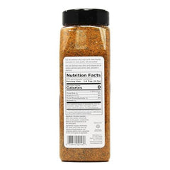 Pouring Badia Mojo Rub Citrus over a steak for flavor
