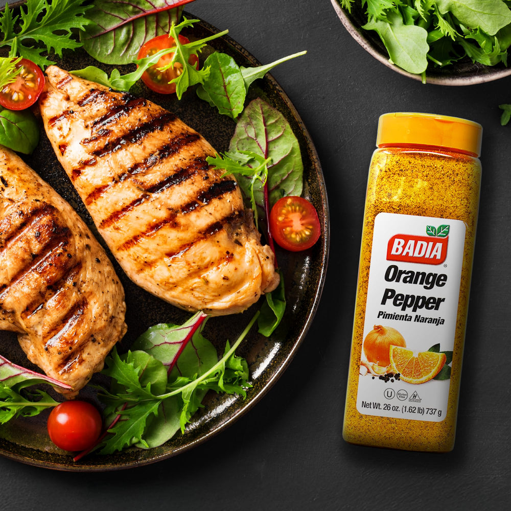 Badia Orange Pepper Seasoning over roasted vegetables for quick weeknight meals.