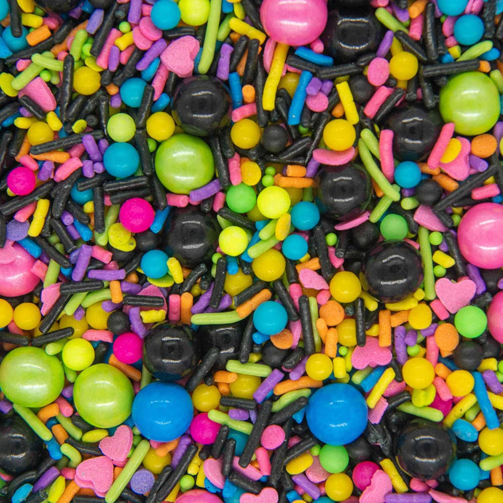 Retro 80s/90s party cake toppers with BakeBright sprinkles for festive desserts