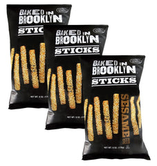 Baked in Brooklyn sesame sticks close-up; crispy snack for dipping.