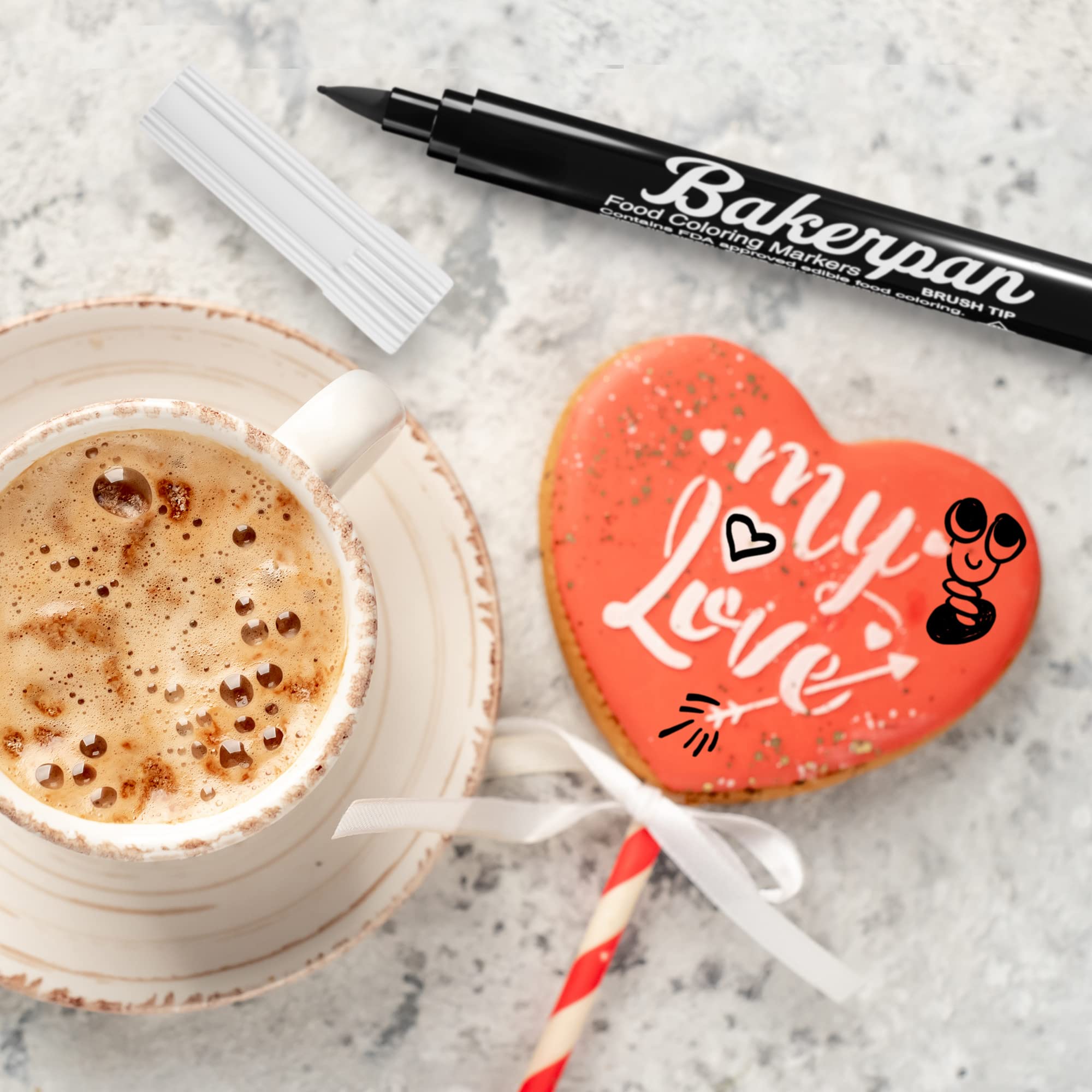 Bakerpan markers work on marshmallows and dried icing for detailed decorations.
