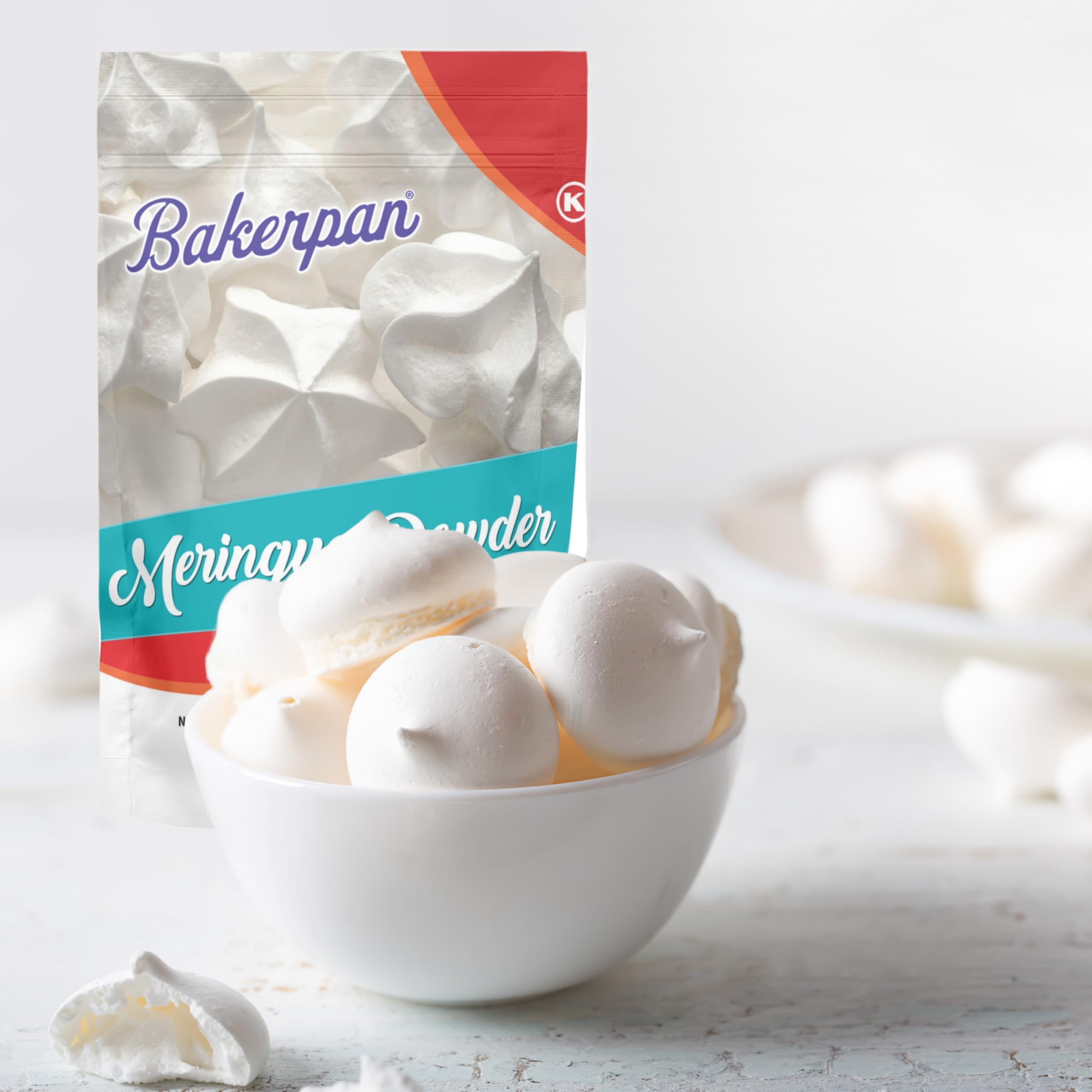 Whisking Bakerpan meringue powder into frosting to stabilize piping.