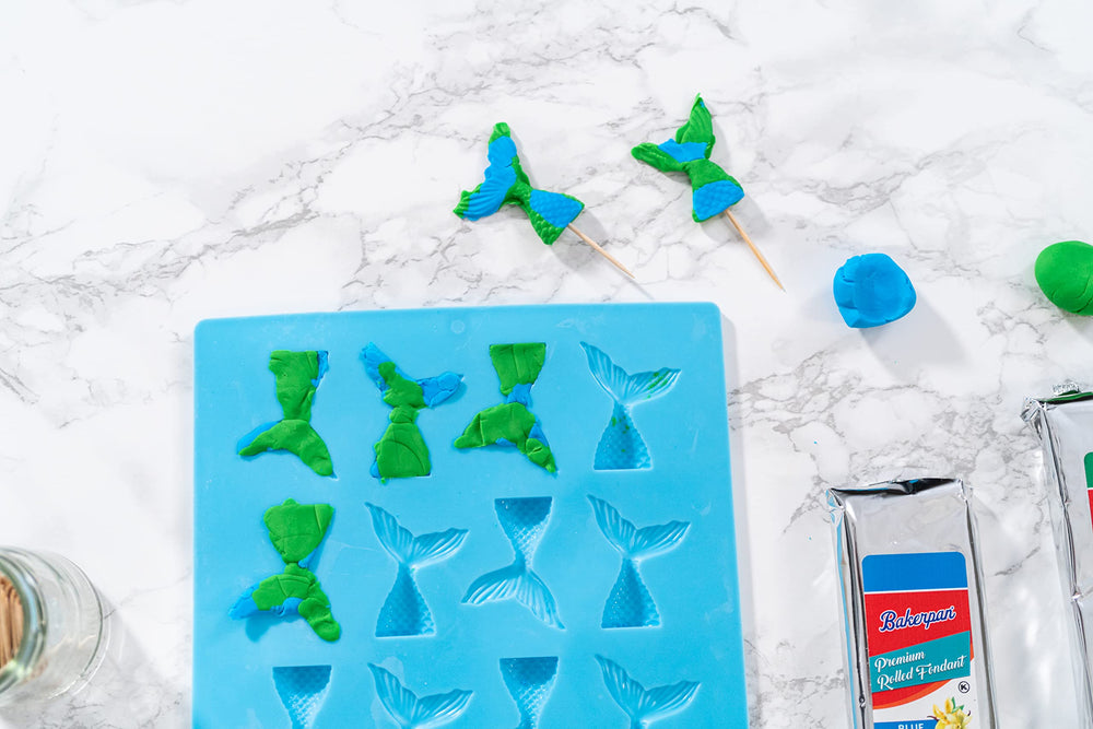 Bakerpan fondant kneaded to soft pliability for easy toppers and designs.