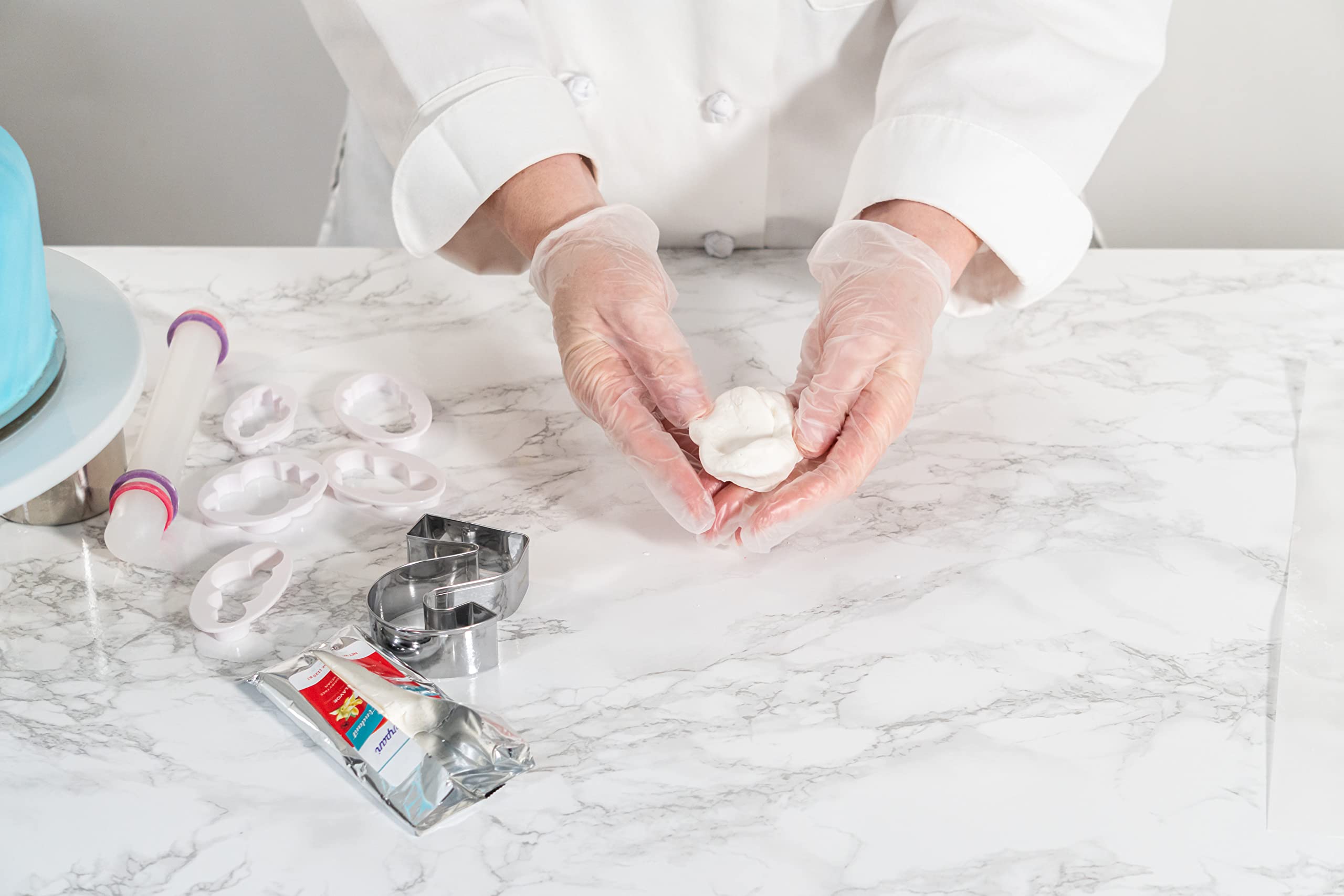 Bakerpan fondant covers cakes evenly for wedding or celebration desserts.