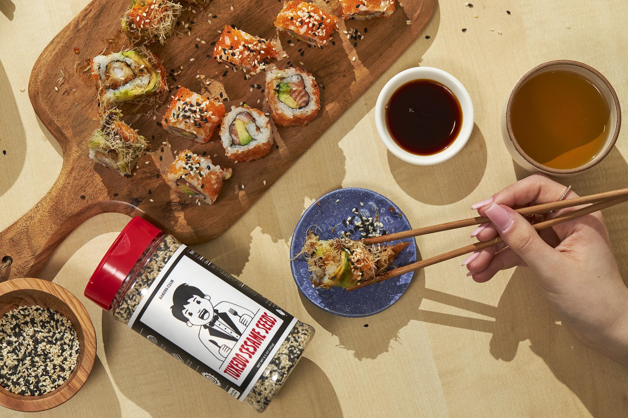 Bakers Club Tuxedo seeds in a stir-fry pan, enhancing savory crunch