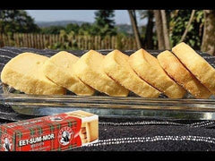 Close-up of Bakers Eet Sum Mor biscuit showing buttery melt-in-your-mouth texture.