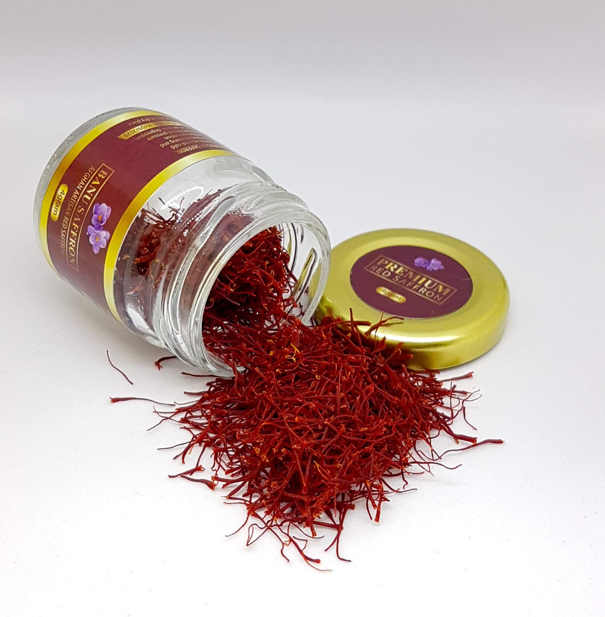 Banu Saffron all-red threads in a jar preserve aroma for vibrant dishes.