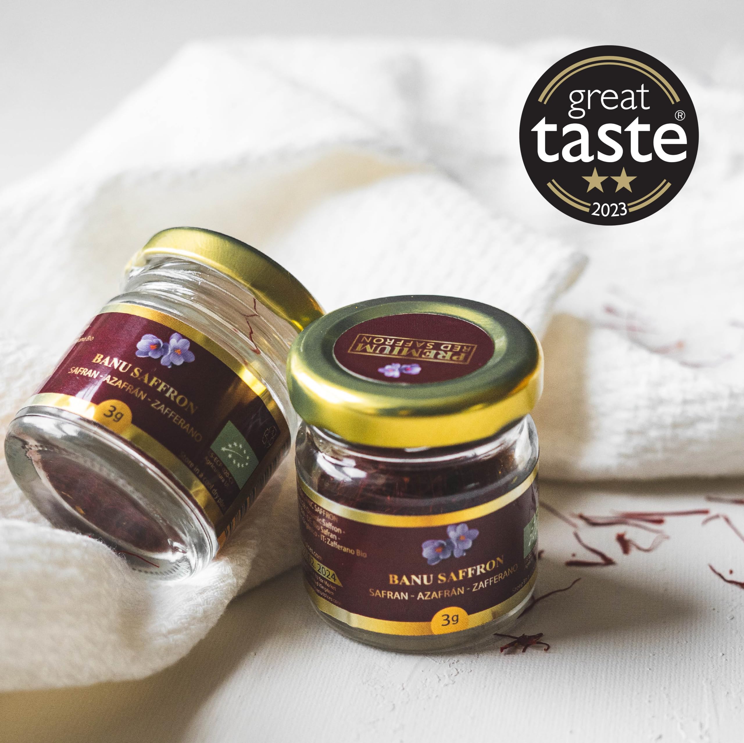 Banu Saffron saffron threads close-up reveal vibrant red strands and aroma.
