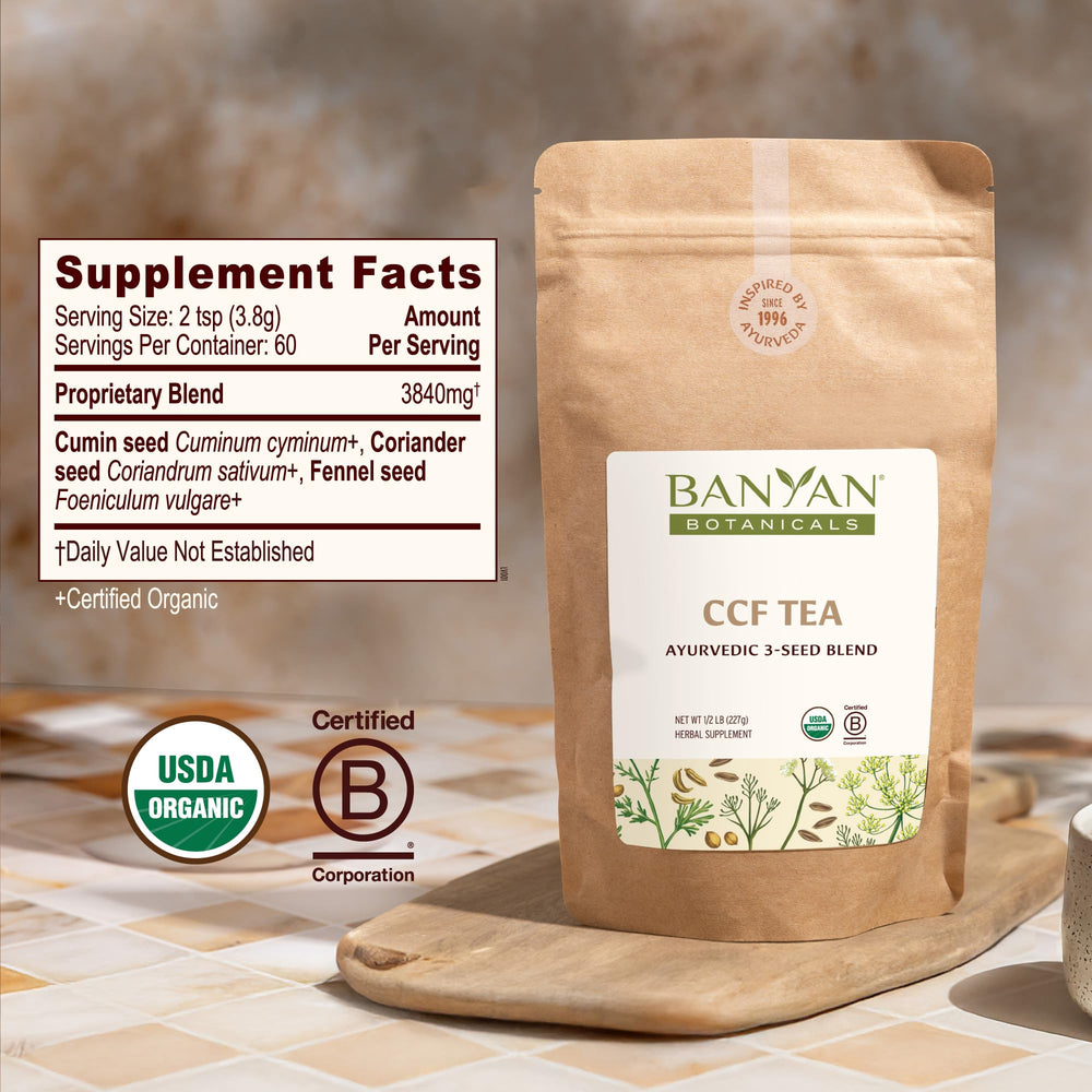 Banyan Botanicals CCF Tea brew close-up with golden infusion for gentle digestive support.
