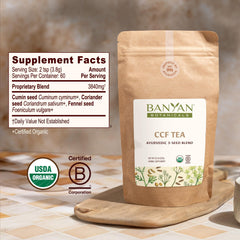 Banyan Botanicals CCF Tea brew close-up with golden infusion for gentle digestive support.