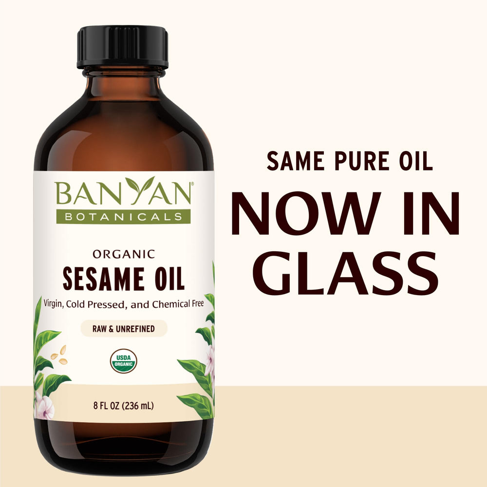 Banyan Botanicals sesame oil near a towel, sets a spa-like self-care moment.