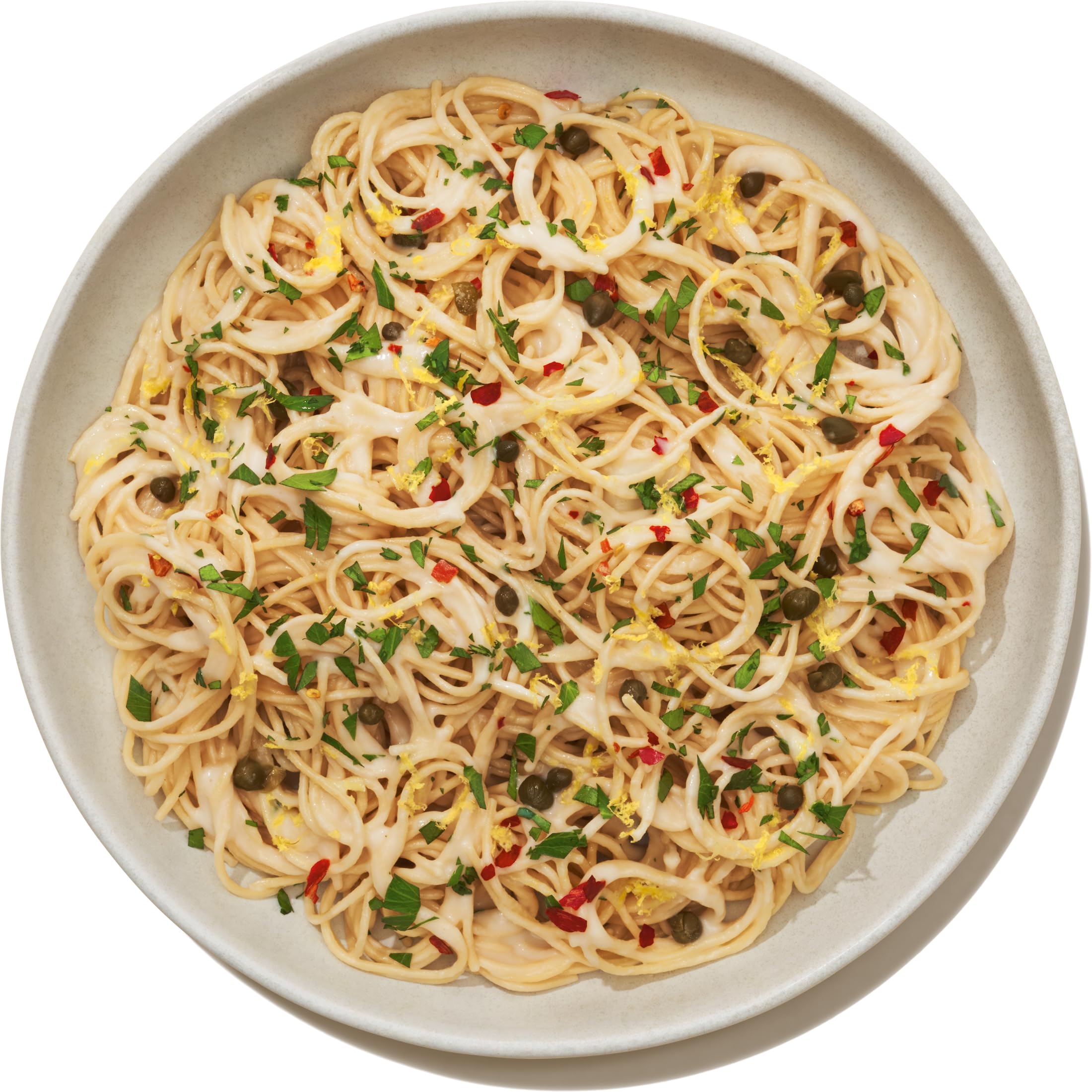 Stovetop pot with BANZA Angel Hair Chickpea pasta and light sauce