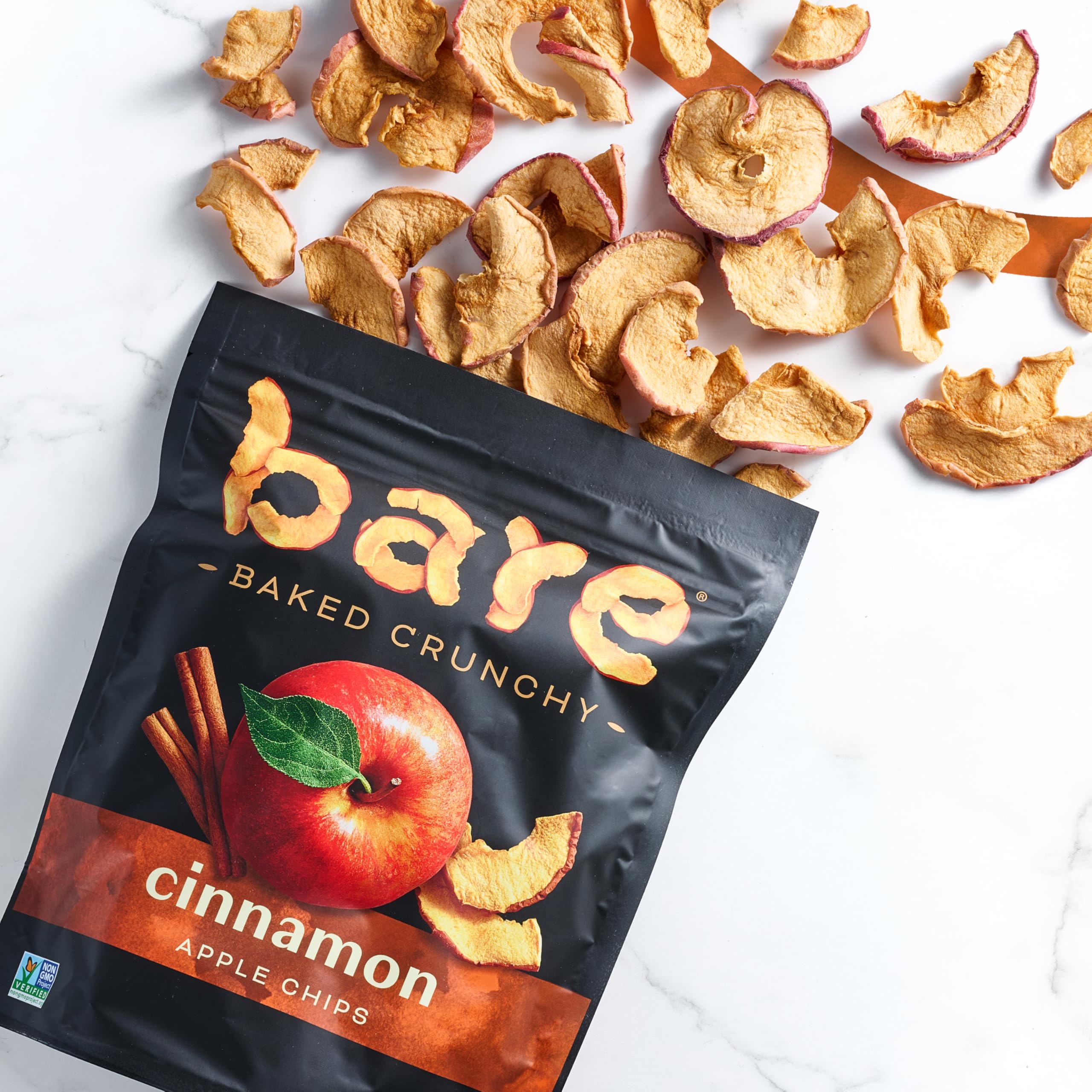 Bare Cinnamon Apple chips label highlights gluten-free, non-GMO, no preservatives.