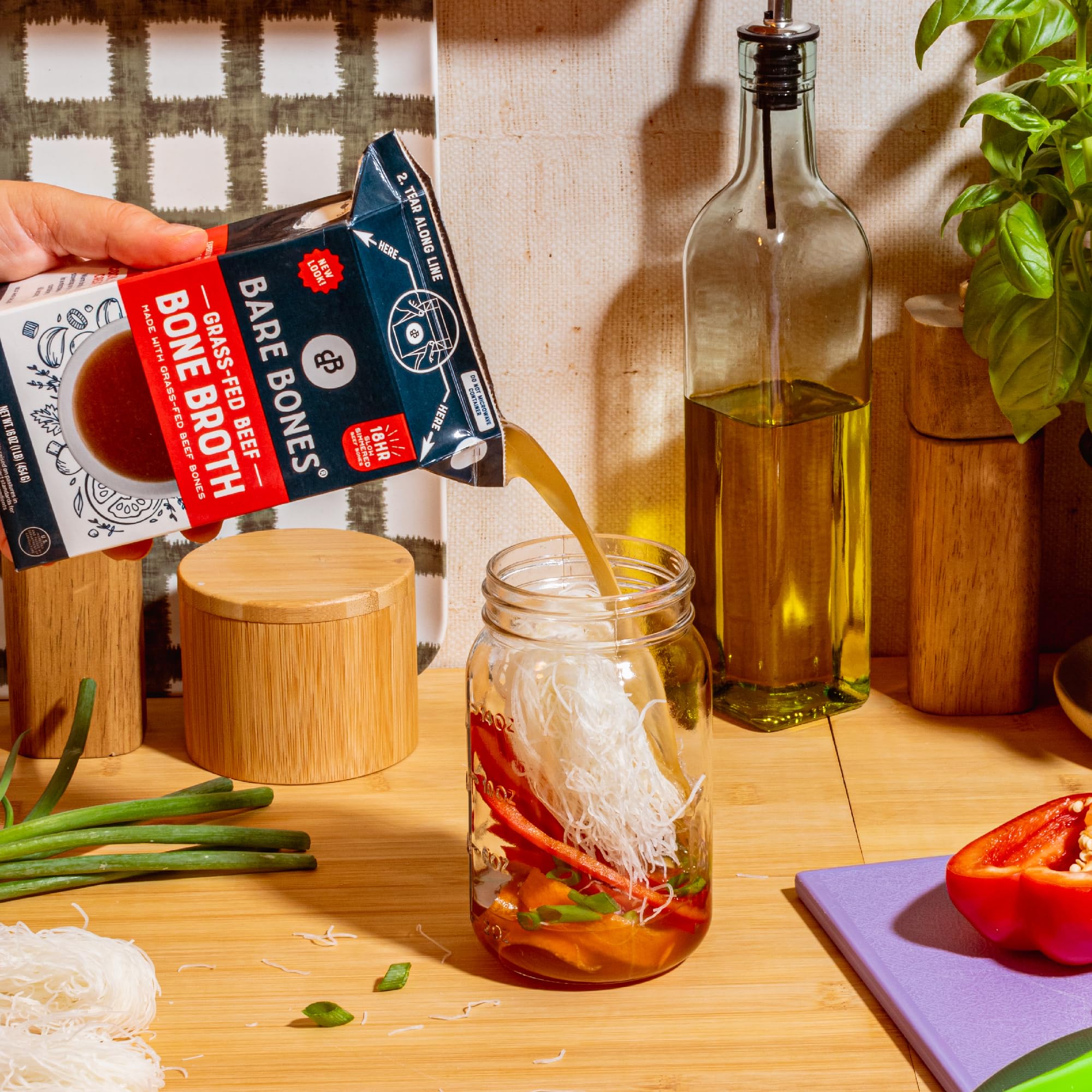 Bare Bones eight-pack cartons displayed for pantry-ready convenience