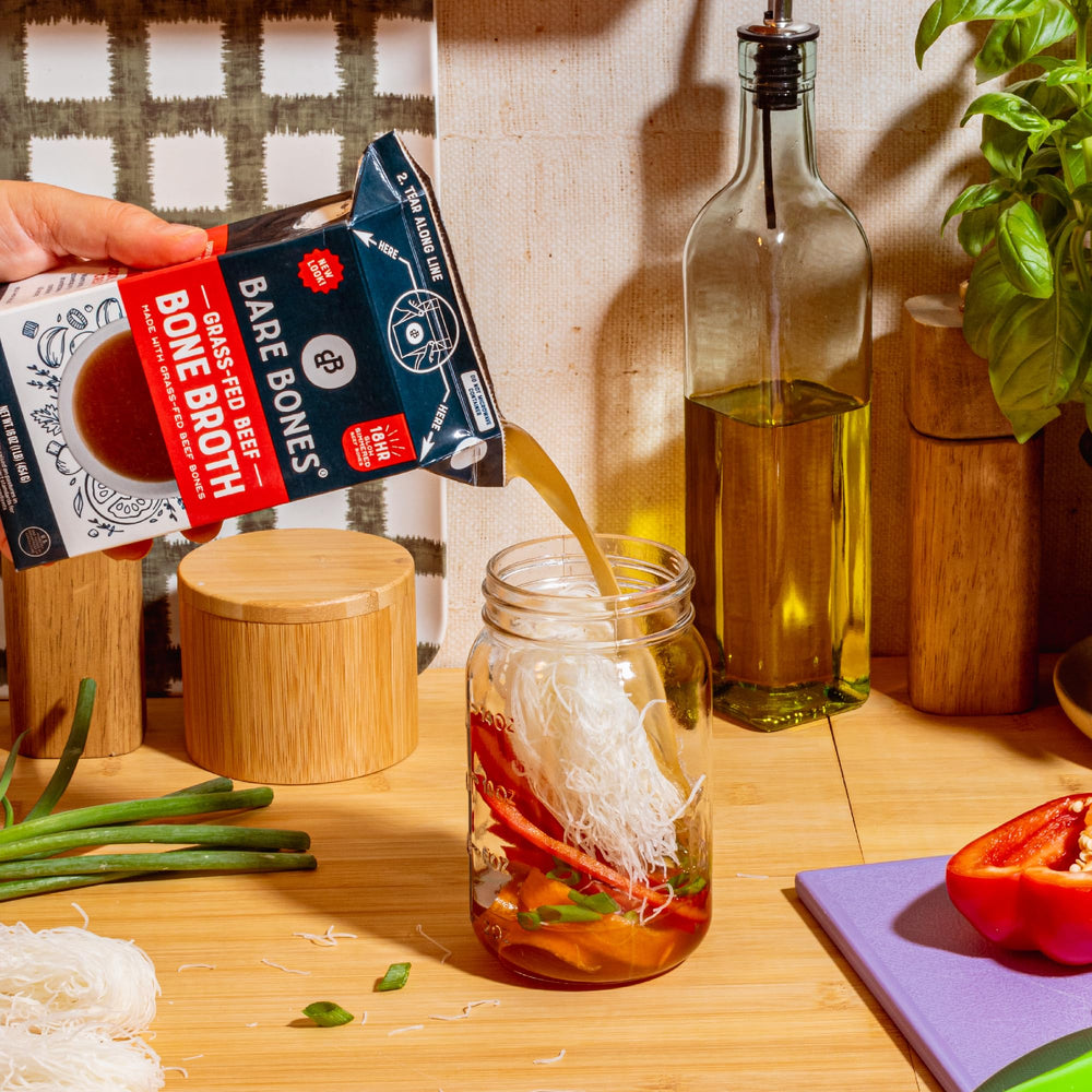 Bare Bones eight-pack cartons displayed for pantry-ready convenience