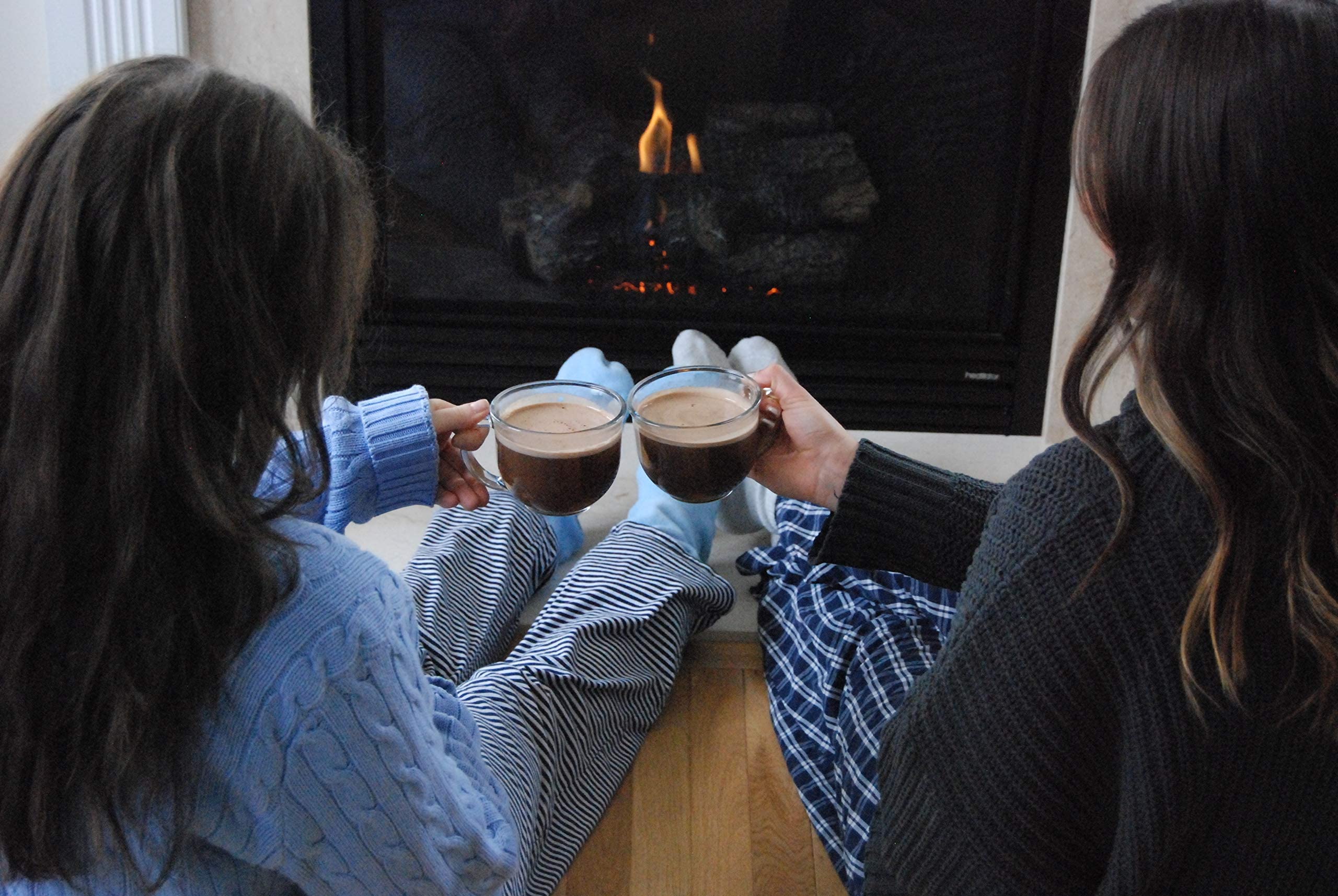 Bare Life cocoa cup on a cozy desk setup with a blanket