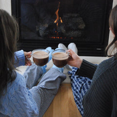 Dissolving Bare Life coconut hot cocoa mix in hot water