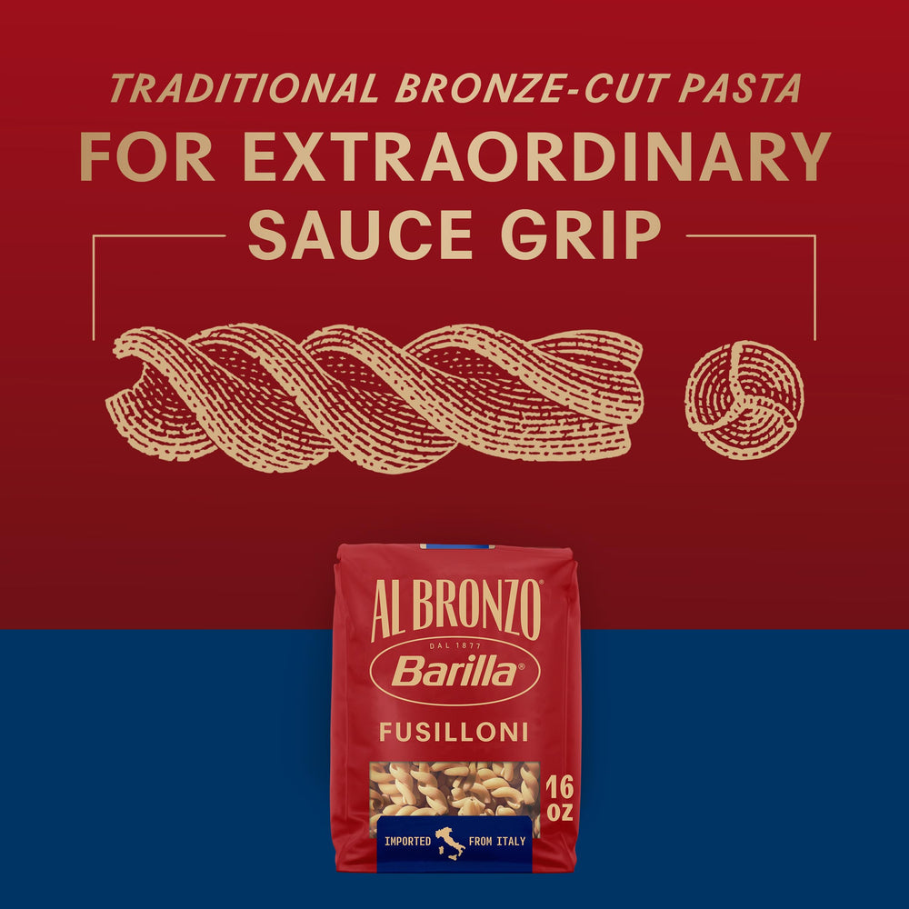 Serving Barilla Al Bronzo Fusilloni with pasta sauce highlights cling and texture.