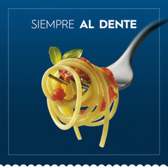 Barilla gluten-free elbows pasta al dente texture demonstrated while boiling.