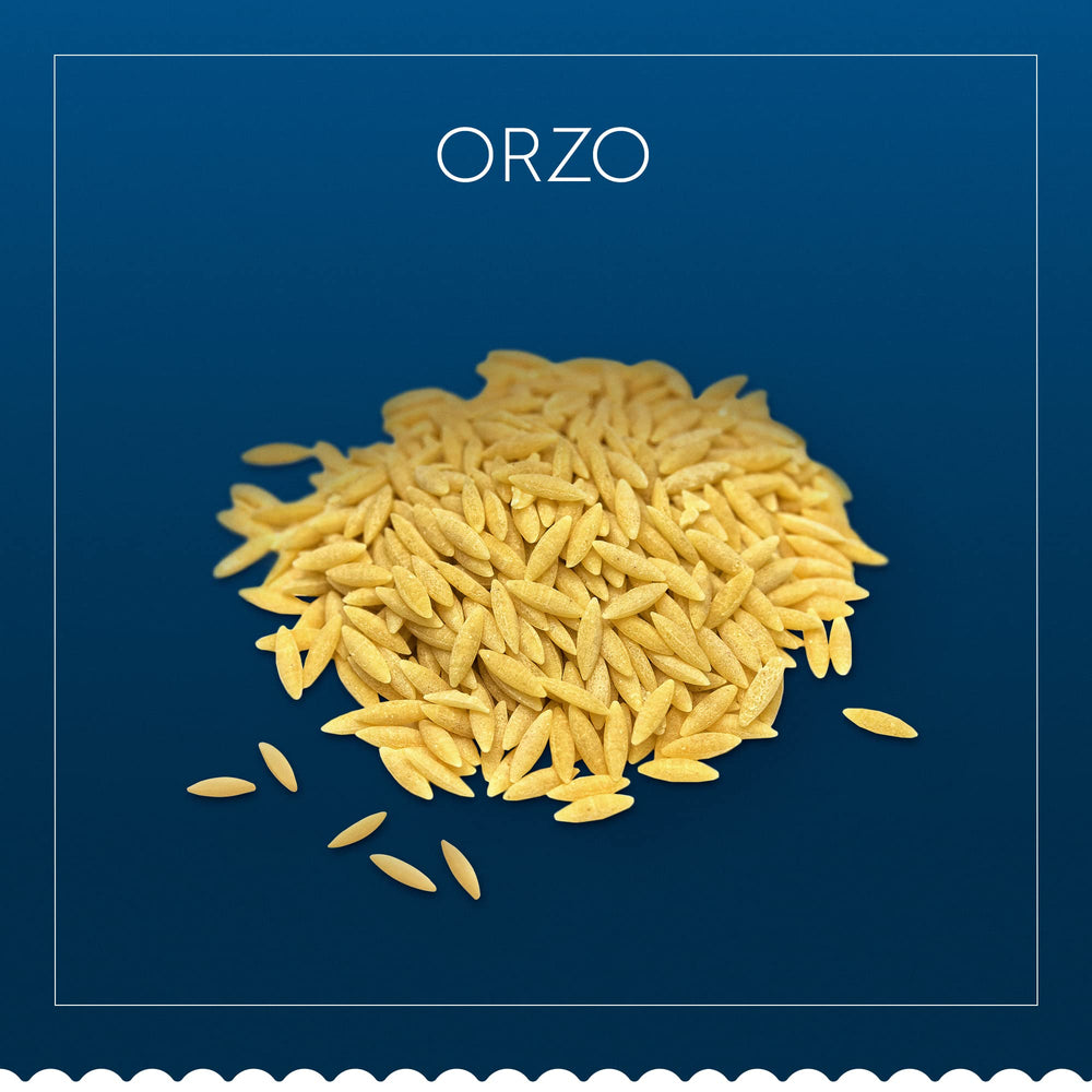 Barilla Orzo served with tomato sauce and cheese for a complete meal.
