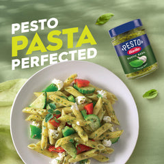 Ingredients close-up highlighting basil and cheese in Barilla pesto.