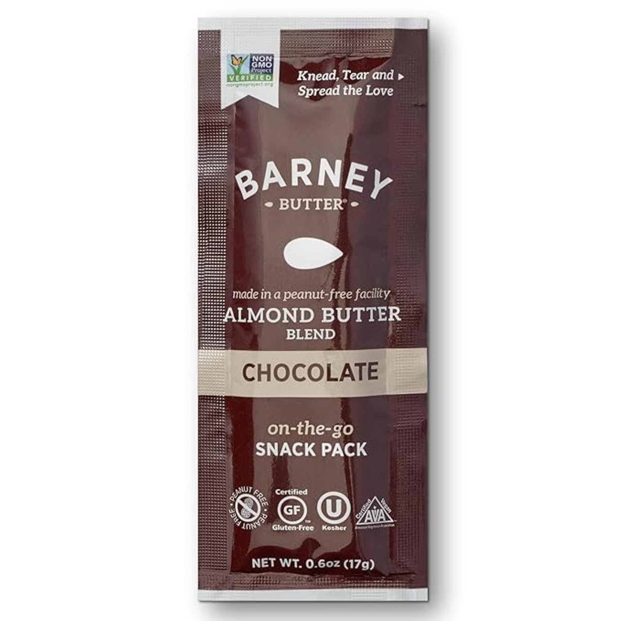 Barney Butter chocolate almond butter on a fruit slice showing single-serve convenience.