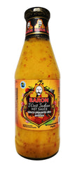Baron West Indian Hot Sauce bottle enhances burgers with bold heat and Caribbean flavor