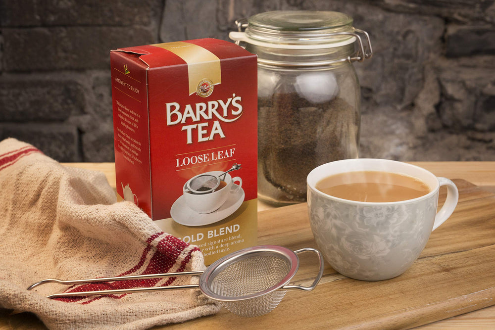 Barry's Gold Blend tea brew showcasing a vibrant golden color and smooth finish.