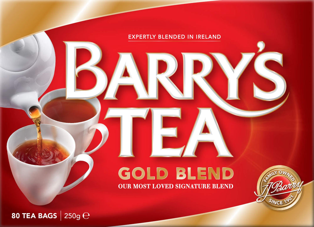 Barry's Tea Gold Blend brewing in cup, steaming pour suggesting comforting morning ritual