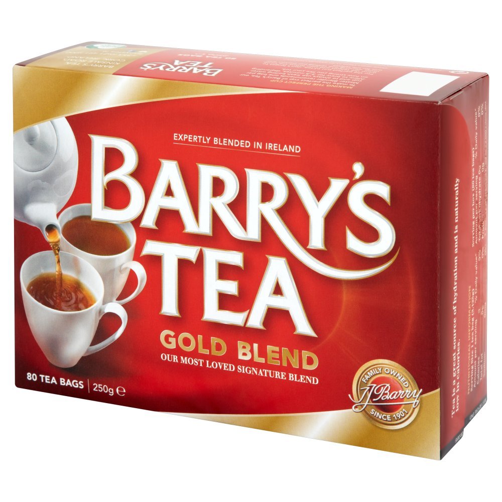 Barry's Tea Gold Blend kettle and cup with teaspoon, inviting afternoon tea break