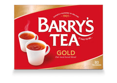 Barry's Tea Gold Blend being poured into a cup, inviting and bright