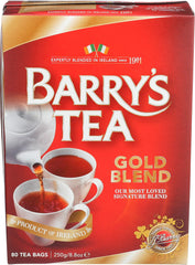 Pouring Barry's Tea Gold Blend to release a fragrant aroma