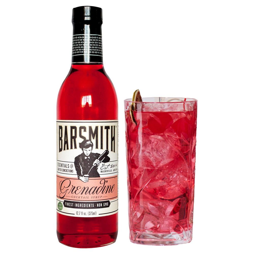 Barsmith Grenadine bottle being poured, ideal for cocktails