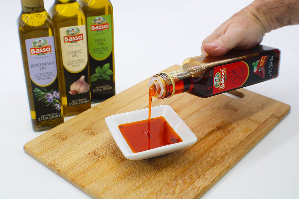 Basso 1904 bottle close-up shows label and vibrant infusion colors for cooking inspiration.