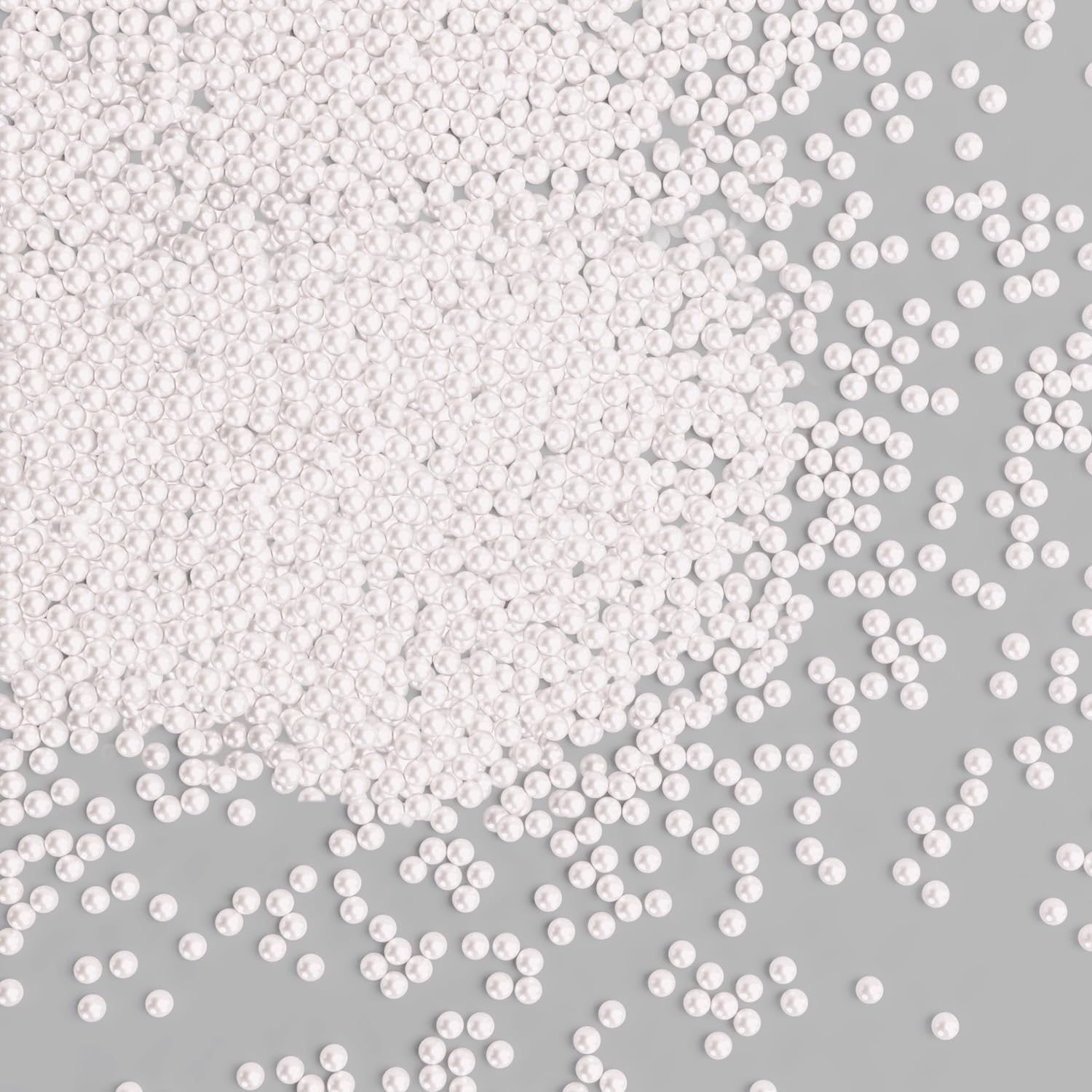 Bayep white edible pearls 2mm bottle adds a refined finishing touch to elegant desserts.